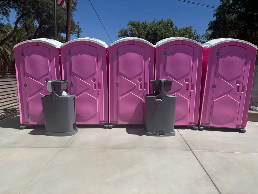Hand washing stations in front of event porta potties