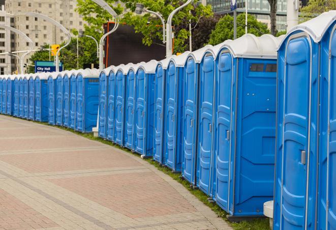 a row of portable restrooms at a fairground, offering visitors a clean and hassle-free experience in edmond