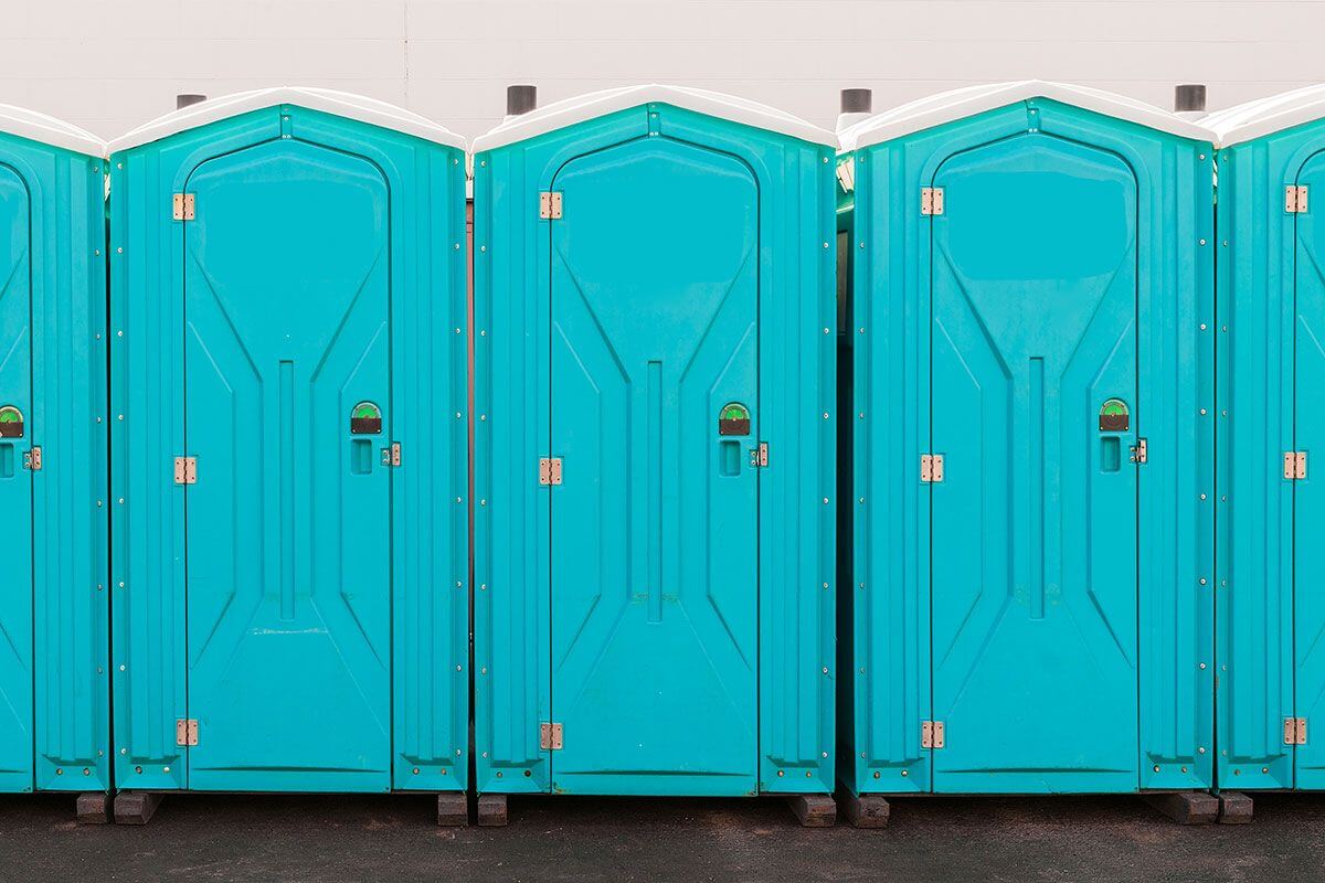 Industrial portable restroom units at a plant in Oklahoma City, Oklahoma